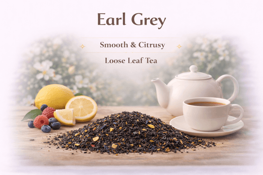 Earl Grey tea blend with loose leaves, lemon, berries, and a teapot showcasing its smooth and citrusy flavor.
