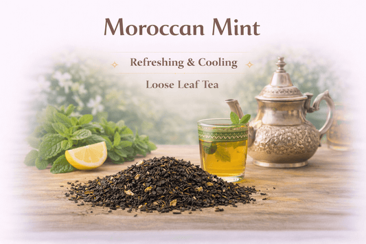 Moroccan mint tea blend with loose leaf tea, mint leaves, and a glass of tea next to a teapot.